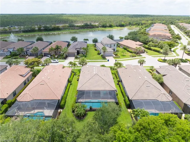 Aerial view of residential area with a nearby body of water