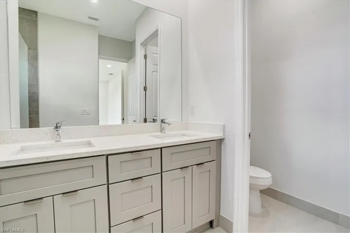 Master Bathroom featuring toilet and vanity