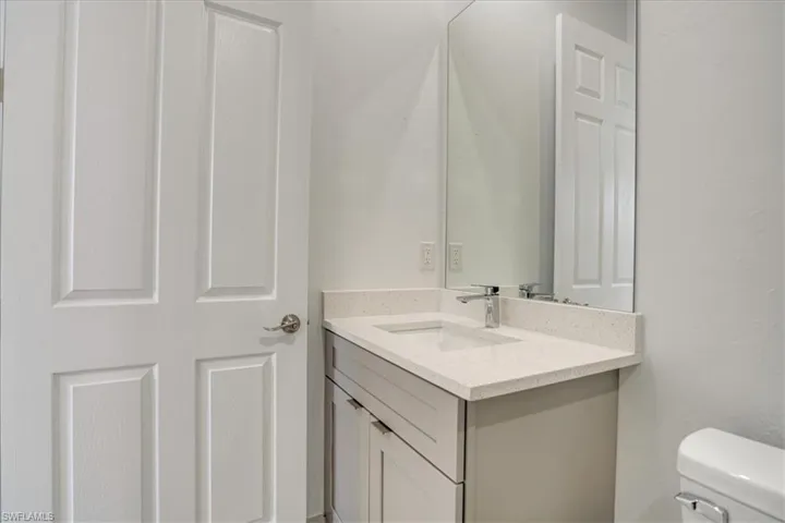Guess Bathroom with toilet and vanity
