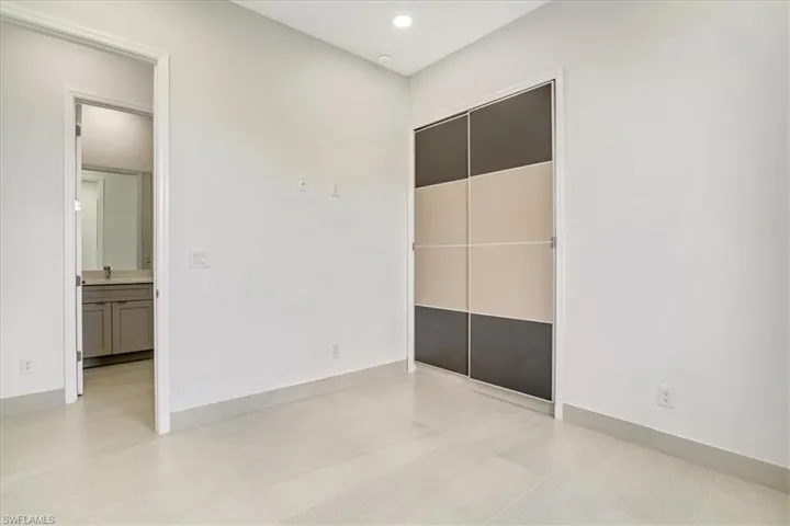 Guess 2 room with light tile patterned floors
