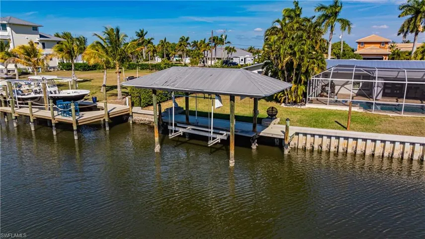 Boat lift with metal roof installed in 2024