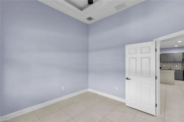 View of tiled spare room