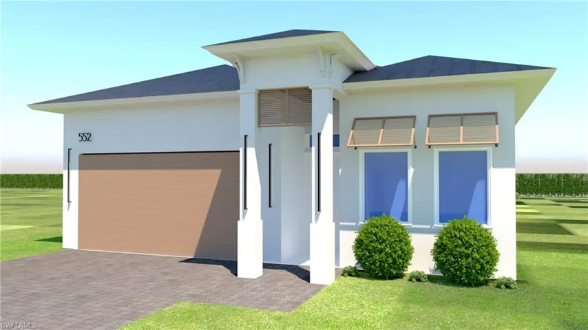View of front facade featuring a garage, a front yard, and stucco siding