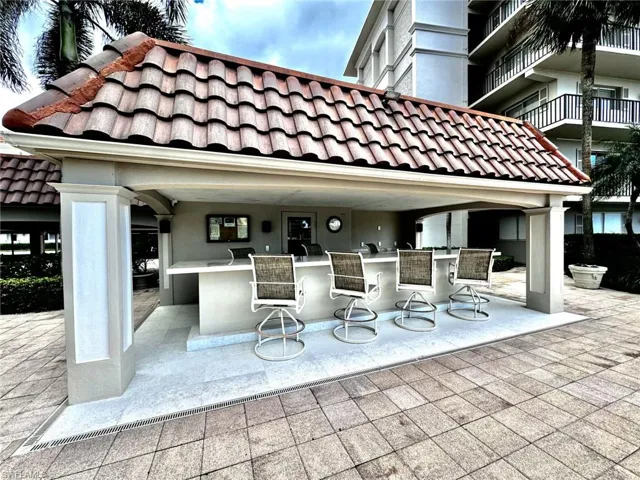 Pool Chickee Bar with kitchen and restrooms