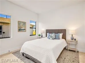 Bedroom with baseboards