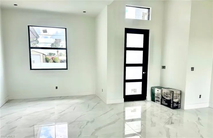 Entrance foyer with marble finish floors