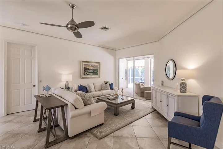 Tiled living room with ceiling fan