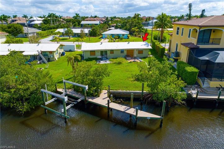 Oversize Dock with boat lift and additional boat slip.