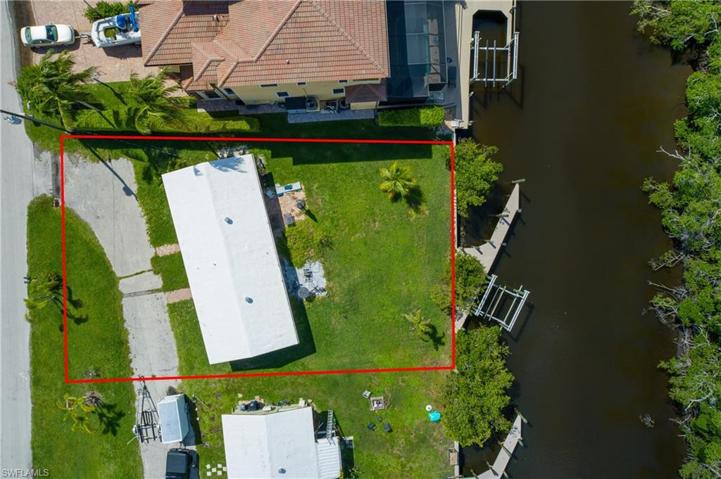 75' canal frontage/seawall. Canal width approx. 80'