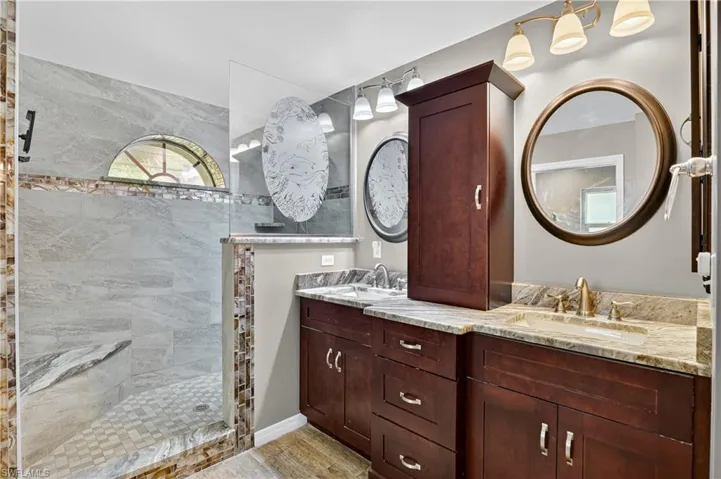 Primary Bathroom with walk in shower and double vanity