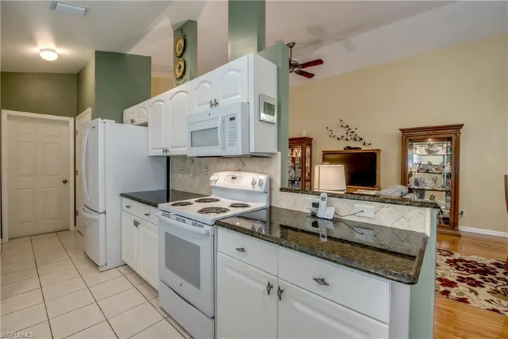 Kitchen range wall.  Bottom mount French Door Refrigerator.