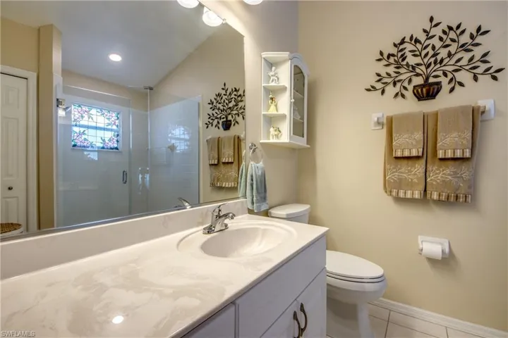 Master Bath with large shower and linen closet.