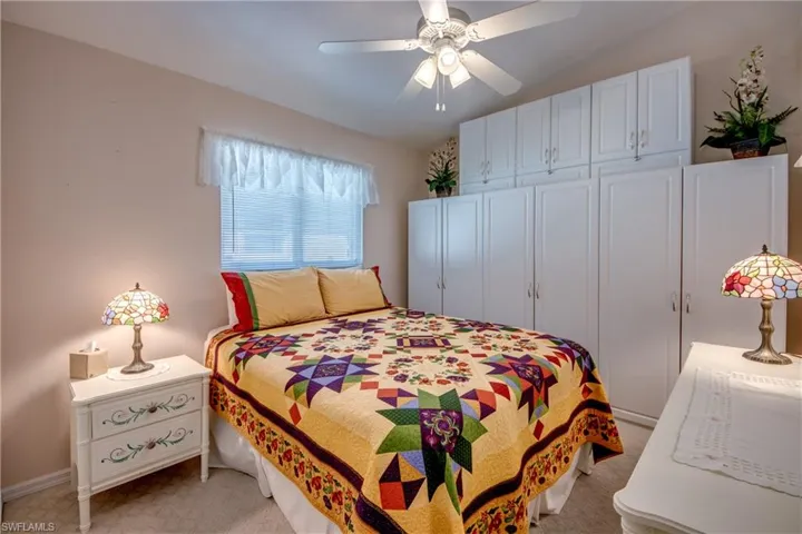 Guest Bedroom with lots of storage space and a walk-in closet.