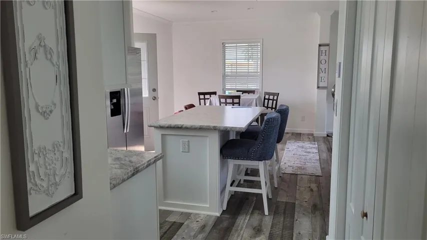 View from hallway leading to kitchen