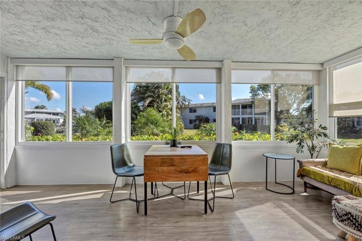 Lanai with sliding impact resistant windows and screens