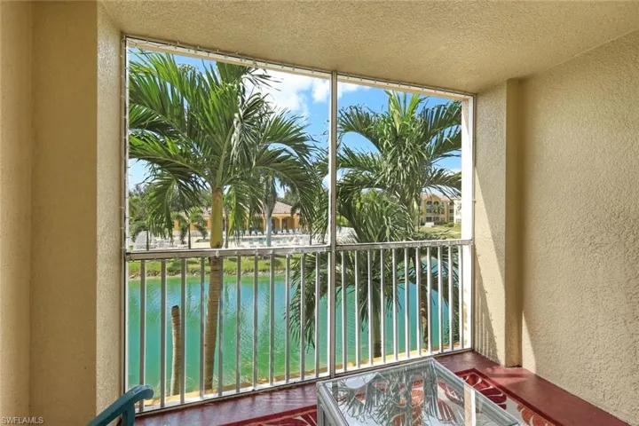 View from Lanai/Living room of pond and Amenity Center Pool