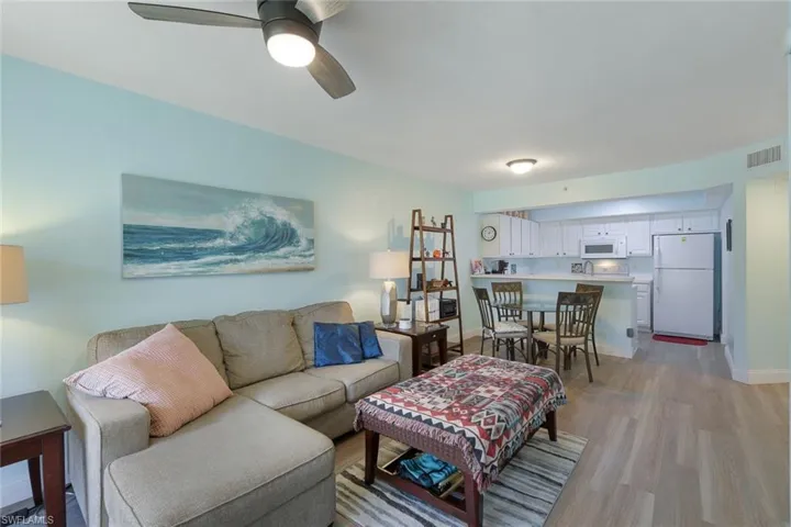 Living Room facing Dining Room and Kitchen