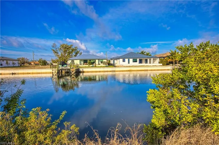 Water view with nearby suburban area