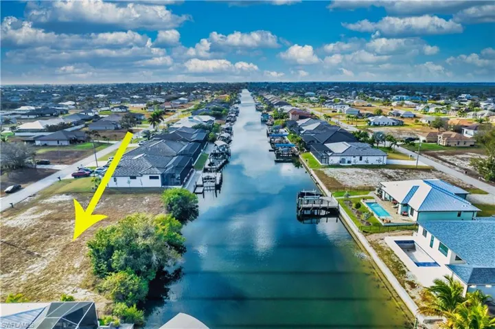 Aerial view of residential area with a nearby body of water