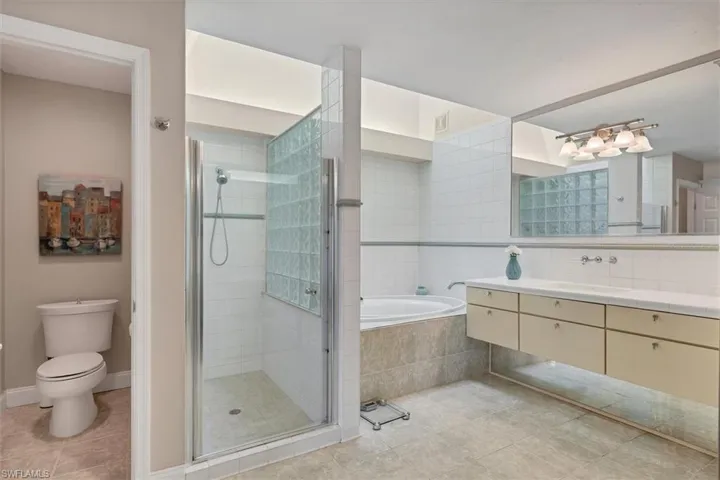 featuring seoerate tub and shower