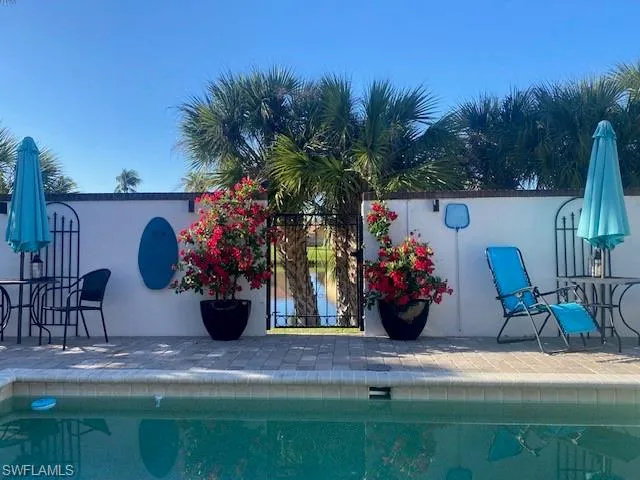 View of swimming pool  out to lake