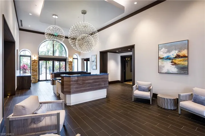 Reception featuring hanging lights and a high ceiling