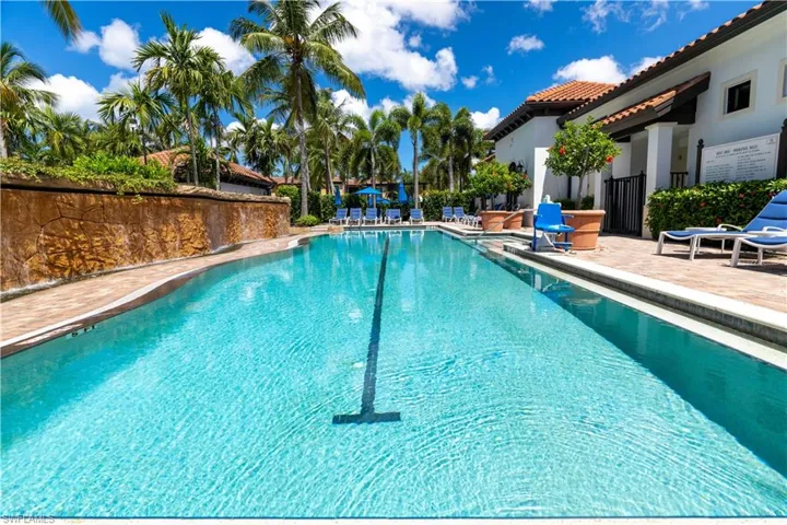Community pool with a patio area