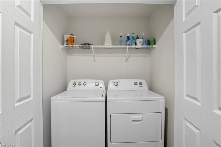 Laundry area featuring washing machine and dryer