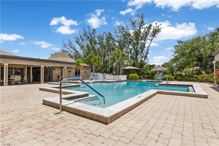 View of swimming pool featuring a sundeck