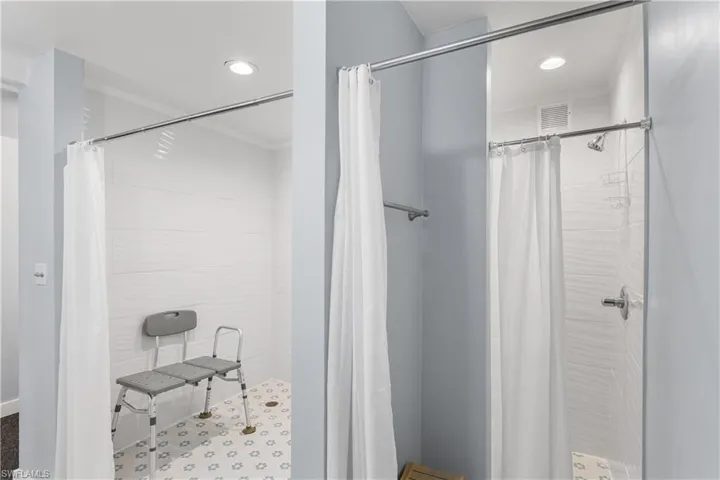 Changing areas, showers, and Bathroom next to the Exercise Room. Sauna, too!