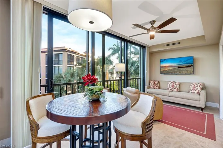 Lanai with dining table and pull out couch