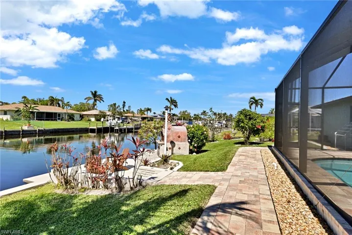 concrete dock, stone walk way around the pool and to the dock area