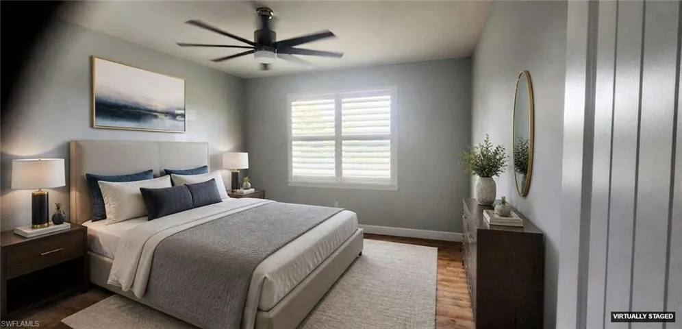 Large Fan. Window to Backyard and Lake.