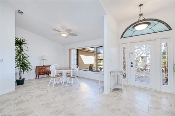 Entryway featuring plenty of natural light and ceiling fan