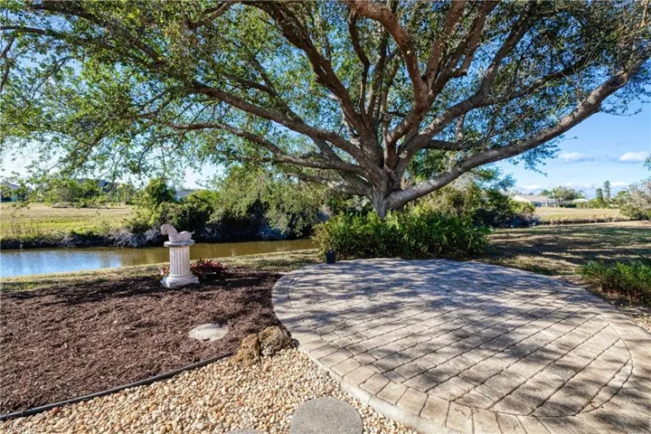 View of patio / terrace with a water view