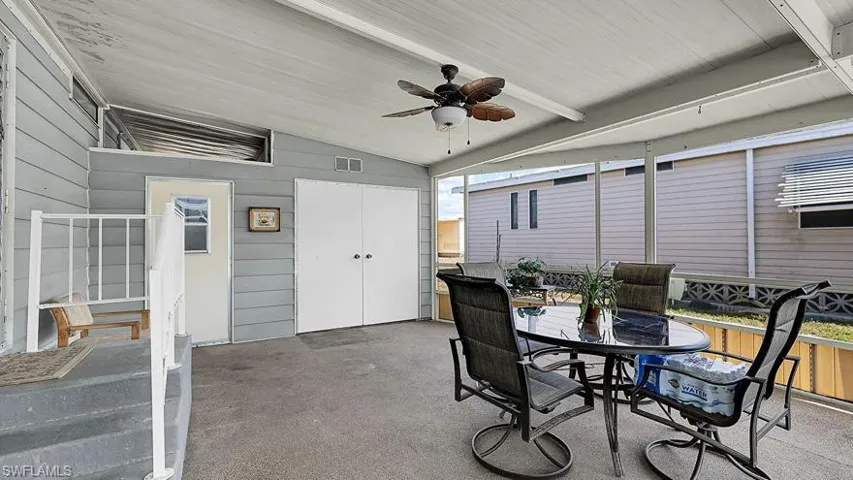 View of patio / terrace with ceiling fan and outdoor dining space