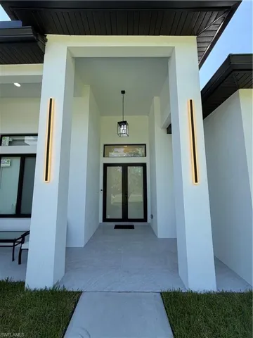 modern entry with high ceilings