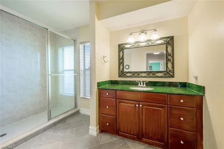 Secondary bath also has exterior door allowing private entry to separate bedrooms
