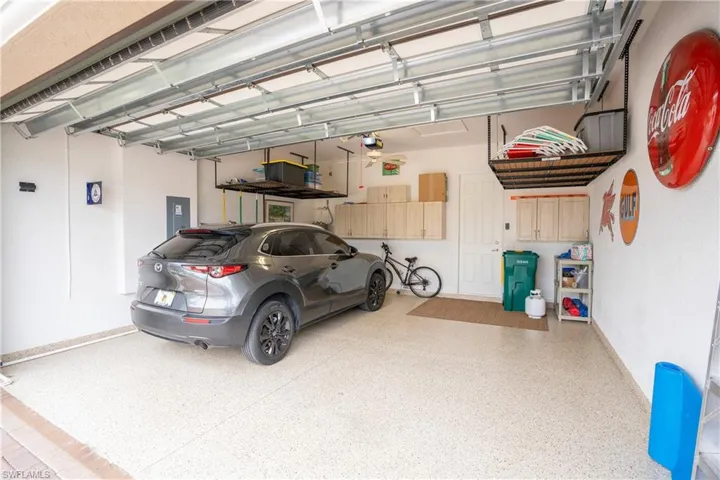 Garage featuring electric panel