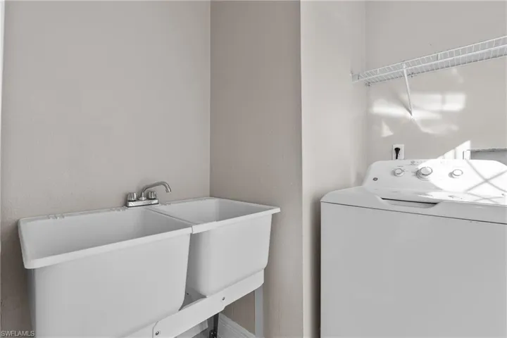 Laundry area featuring washer / dryer