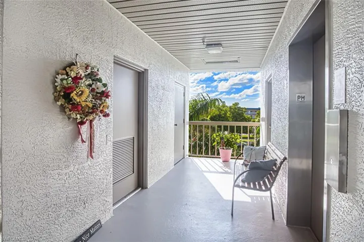 Balcony featuring elevator
