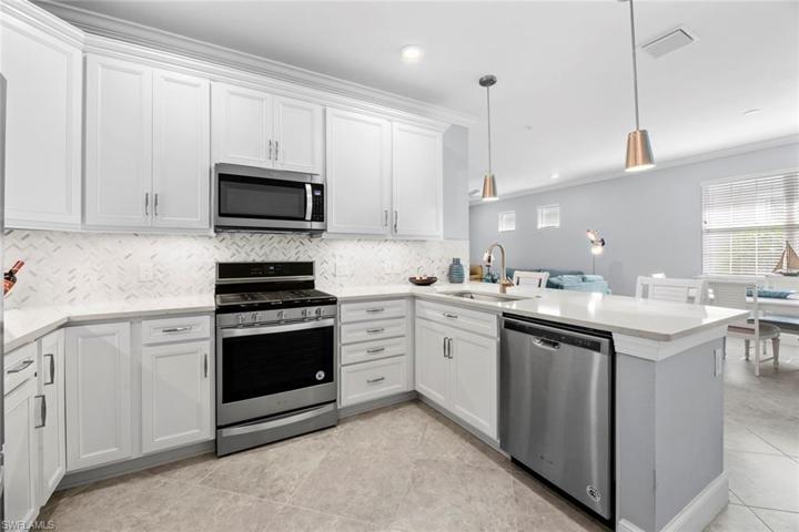 Quartz counters and tile back splash