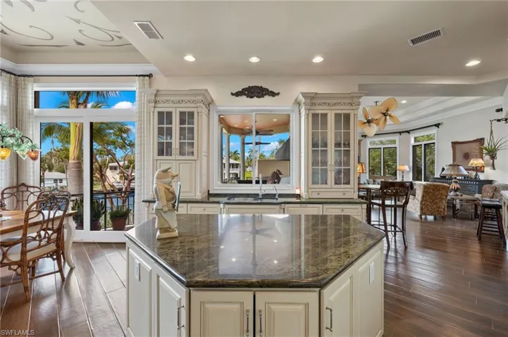 KITCHEN, BREAKFAST DINING AND FAMILY ROOM