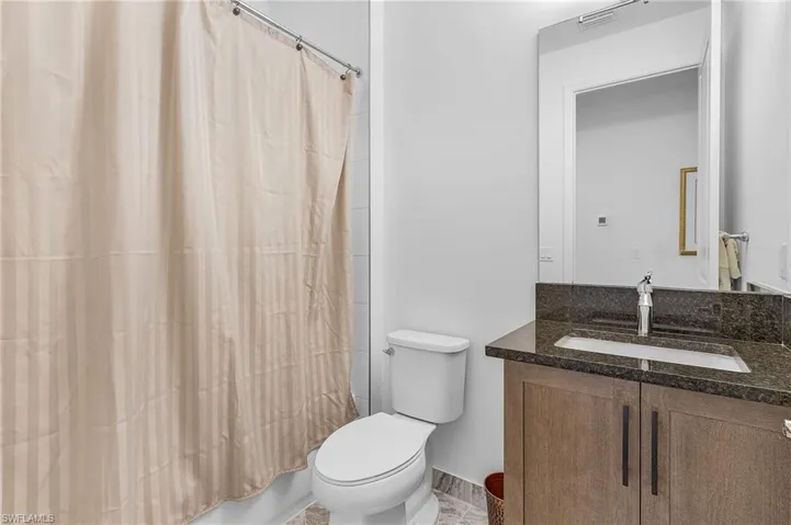 Hallway Bathroom will full tub/shower