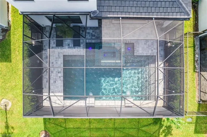 Arial view of pool and screened in lanai - extra large pool!