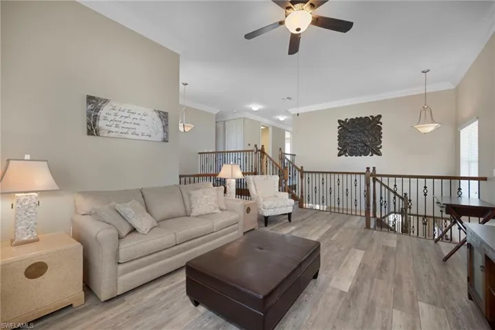 A GREAT SPOT TO ENJOY TIME WITH YOUR FAMILY IN A VERY FLEXIBLE  ROOM. NOTE THE BEAUTIFUL FLOORING.