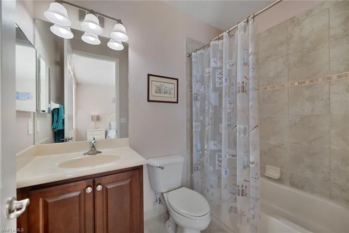 GUEST BATH 2 WITH A TUB/SHOWER.