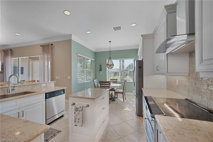 ENJOY THE SOUTHERN EXPOSURE FROM THIS UPDATED KITCHEN.