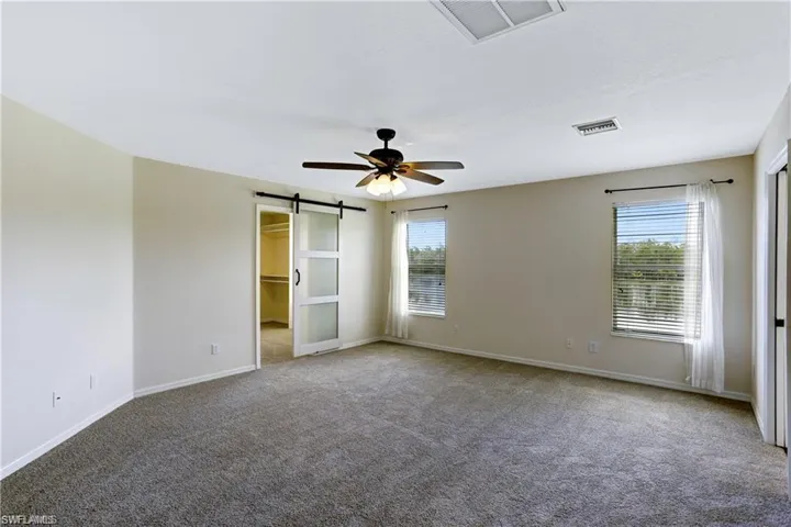 Lake views, barn door into closet!