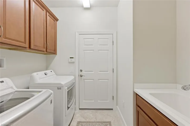 With utility Sink and extra Cabinets